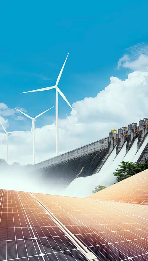 Image of solar panels and wind turbines and water and bridge