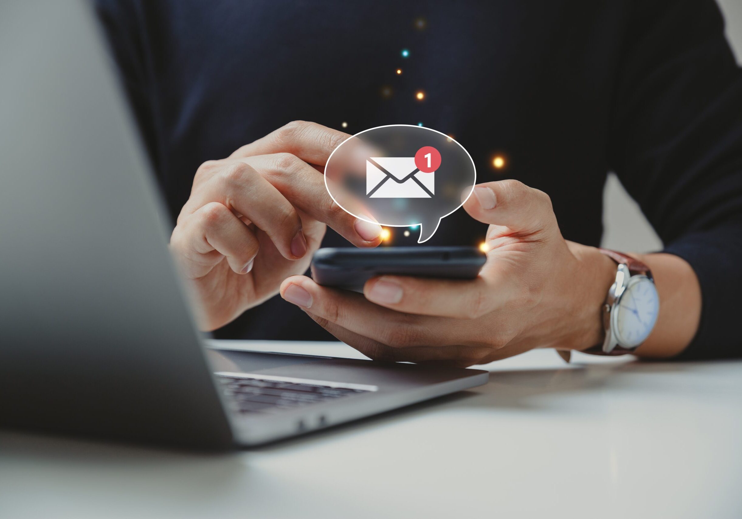 Hand,Of,Businessman,Using,Smartphone,For,Email,With,Notification,Alert, Person getting job alerts through to phone
