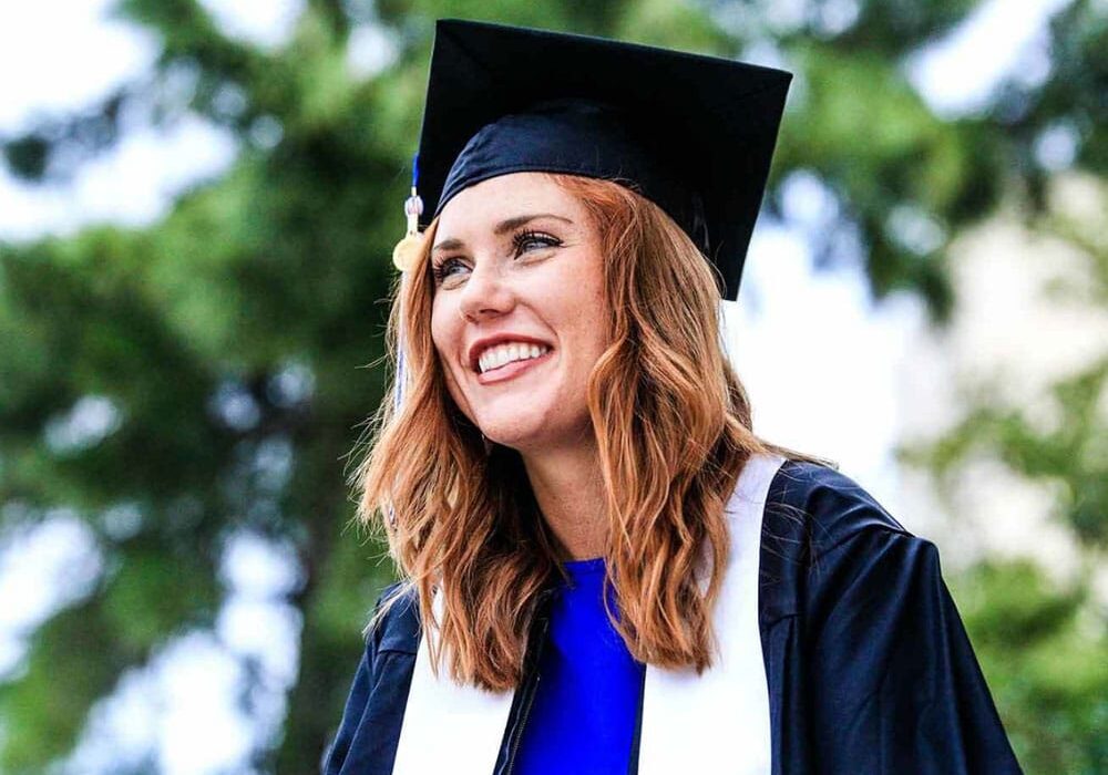 A woman graduating for graduate blog