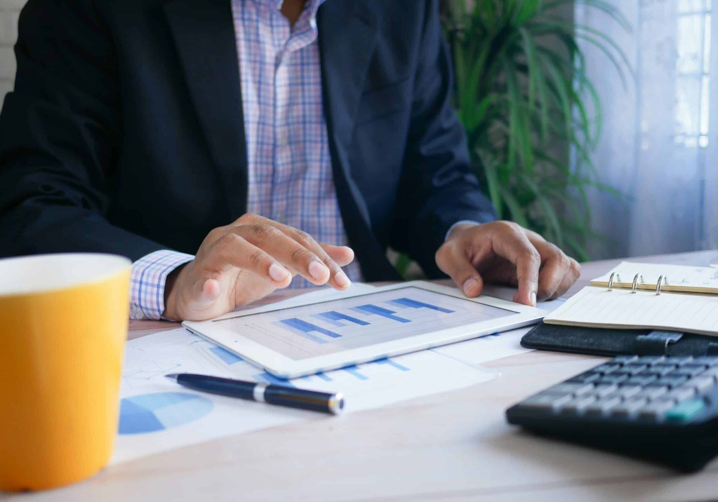 finance professional looking at figures